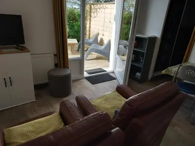 Coin salon dans l'établissement Gîte la Beautėe