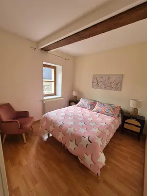 Un ou plusieurs lits dans un hébergement de l'établissement Maison cosy au centre historique de Bayeux