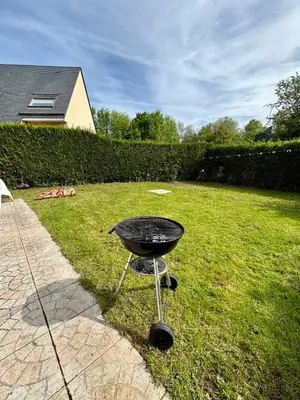Jardin de l'établissement Charmante maison familiale