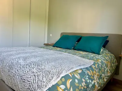 Un ou plusieurs lits dans un hébergement de l'établissement Maison au calme, à la campagne