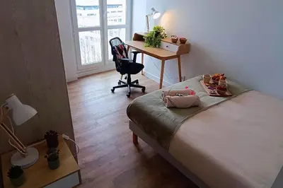 Un ou plusieurs lits dans un hébergement de l'établissement Appartement neuf - 3 chambres - 6 personnes - 73m² vue sur la ville