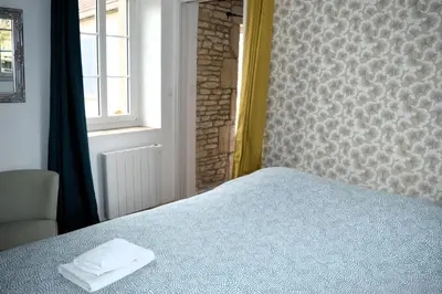 Un ou plusieurs lits dans un hébergement de l'établissement Petite vague - maison atypique avec terrasse