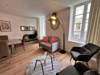 Coin salon dans l'établissement L'Elégant Bayeusain - Appartement 4P Centre Bayeux