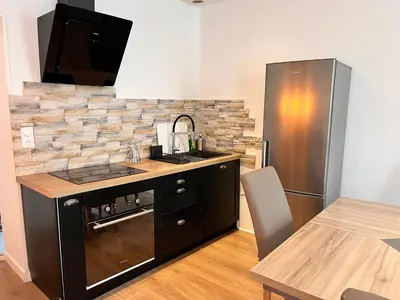 Cuisine ou kitchenette dans l'établissement L'Elégant Bayeusain - Appartement 4P Centre Bayeux