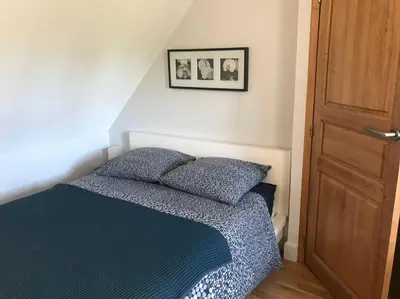 Un ou plusieurs lits dans un hébergement de l'établissement Gite Normand sur les plages du débarquement.