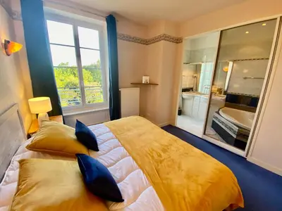 Un ou plusieurs lits dans un hébergement de l'établissement La Clef Decamp Clos Minotte 30 pers jacuzzi, billard, baby-foot