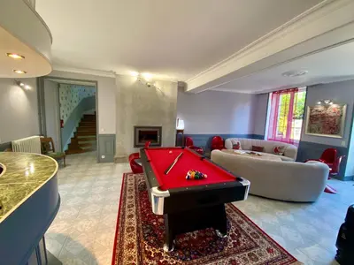 Coin salon dans l'établissement La Clef Decamp Clos Minotte 30 pers jacuzzi, billard, baby-foot