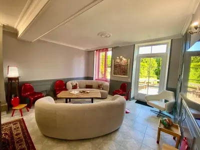 Coin salon dans l'établissement La Clef Decamp Clos Minotte 30 pers jacuzzi, billard, baby-foot