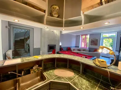 Coin salon dans l'établissement La Clef Decamp Clos Minotte 30 pers jacuzzi, billard, baby-foot