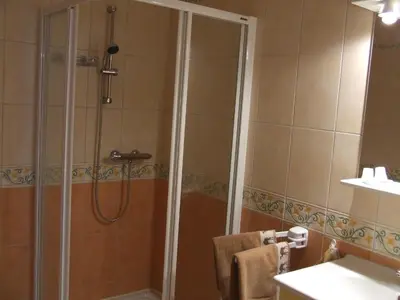 Salle de bains dans l'établissement Les Abris de la Sée
