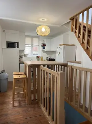 Cuisine ou kitchenette dans l'établissement Duplex cosy hyper centre Caen