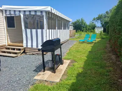 Jardin de l'établissement Mobil-home bord de mer