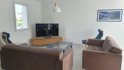 Télévision ou salle de divertissement dans l'établissement Le gite de la grange de dime