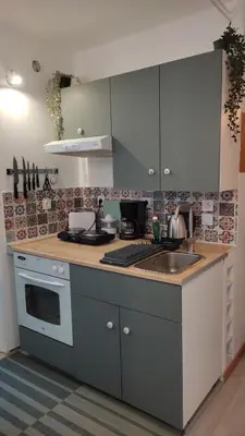 Cuisine ou kitchenette dans l'établissement Pause Bayeux