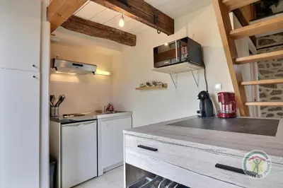 Cuisine ou kitchenette dans l'établissement Tombelaine