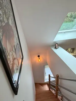 Télévision ou salle de divertissement dans l'établissement Duplex Parapluies de Cherbourg Netflix Parking