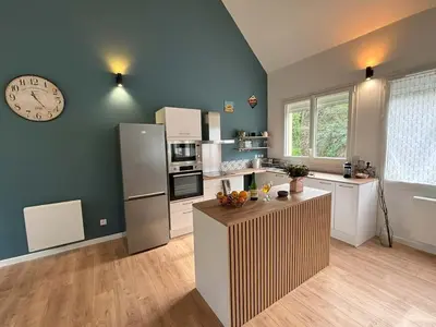 Cuisine ou kitchenette dans l'établissement Duplex Parapluies de Cherbourg Netflix Parking
