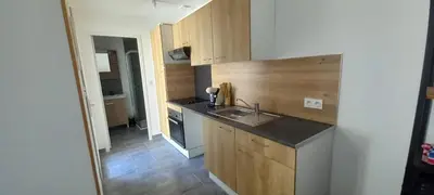 Cuisine ou kitchenette dans l'établissement La maisonnette cherbourgeoise