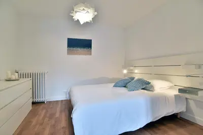 Un ou plusieurs lits dans un hébergement de l'établissement La Perlezen - Appt pour 4 à 100m de la plage