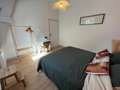 Un ou plusieurs lits dans un hébergement de l'établissement Belle maison au calme avec parking