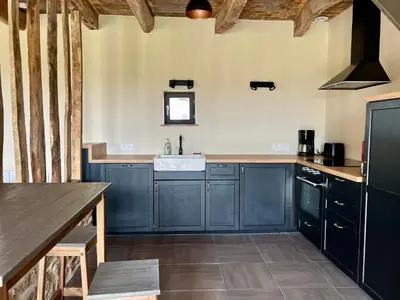 Cuisine ou kitchenette dans l'établissement Gîte de la Tessonnière