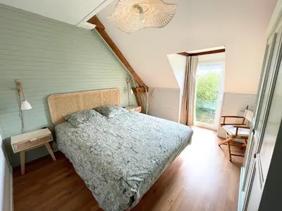 Un ou plusieurs lits dans un hébergement de l'établissement Gîte la Coquille - Chaleureux & paisible