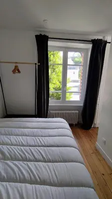 Un ou plusieurs lits dans un hébergement de l'établissement Appartement 1 Maison Dior, centre, plage à 500 m