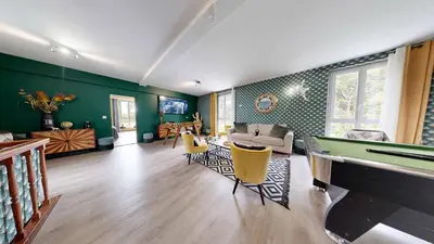 Coin salon dans l'établissement La Clef Decamp Domaine de Lalie 20pers piscine tennis, 8min mer