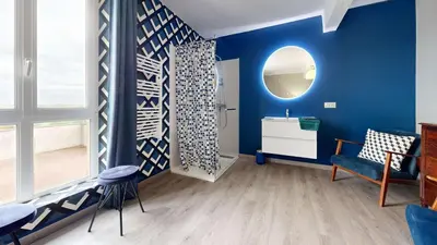 Coin salon dans l'établissement La Clef Decamp Domaine de Lalie 20pers piscine tennis, 8min mer