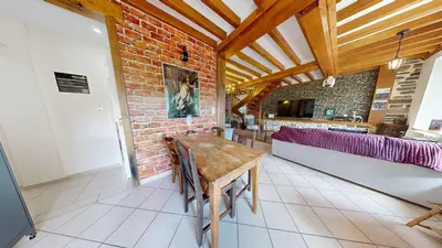 Coin salon dans l'établissement La Clef Decamp Moulin Harry 21 pers 10 min Viaduc de la Souleuvre