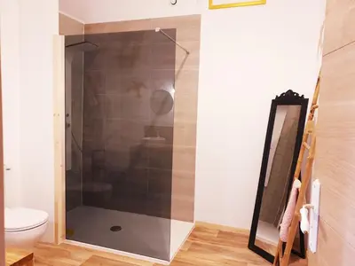Salle de bains dans l'établissement Le Refuge des Chouettes