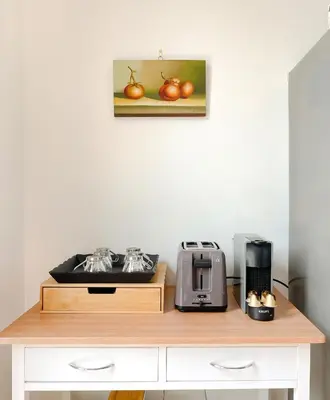 Cuisine ou kitchenette dans l'établissement La Villa des Hortensias