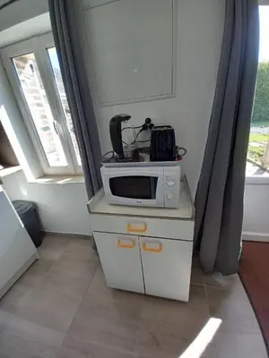 Cuisine ou kitchenette dans l'établissement Petite maison du Tronquay