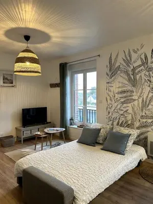 Télévision ou salle de divertissement dans l'établissement Appartement de la plage