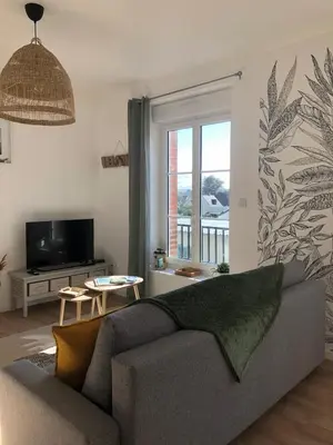 Télévision ou salle de divertissement dans l'établissement Appartement de la plage