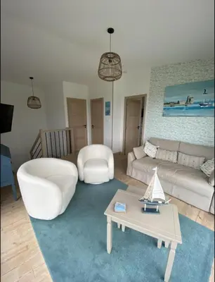 Coin salon dans l'établissement Face aux Isles