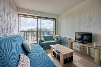 Télévision ou salle de divertissement dans l'établissement Prince - À 500m de la plage