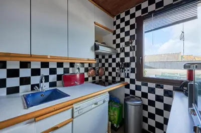 Cuisine ou kitchenette dans l'établissement Prince - À 500m de la plage