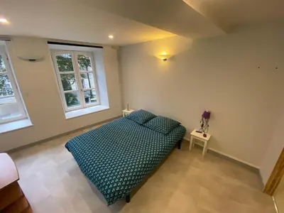 Un ou plusieurs lits dans un hébergement de l'établissement Appartement ou chambre centre cherbourg