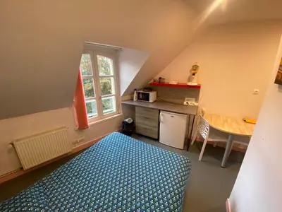 Cuisine ou kitchenette dans l'établissement Appartement ou chambre centre cherbourg