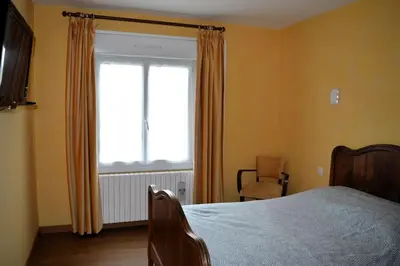 Un ou plusieurs lits dans un hébergement de l'établissement Le Dortoir, maison familiale - jardin - 5km mer