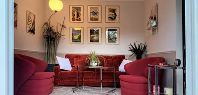 Coin salon dans l'établissement Mont Joly Gîte