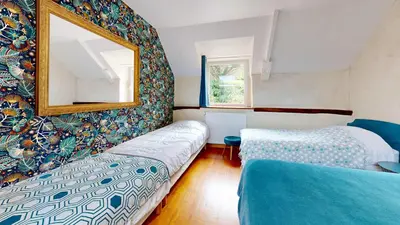 Un ou plusieurs lits dans un hébergement de l'établissement La Clef Decamp Hambye'ance Nature 28pers spa finlandais billard