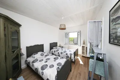 Un ou plusieurs lits dans un hébergement de l'établissement Le Cottage du Moulin - 15min du Mont Saint-Michel