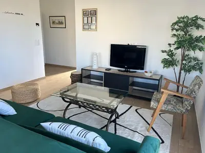 Télévision ou salle de divertissement dans l'établissement La Maison des Copains au coeur du DDAY