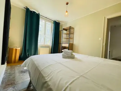 Un ou plusieurs lits dans un hébergement de l'établissement L'Alma 8 : Le Calme au Coeur de Cherbourg