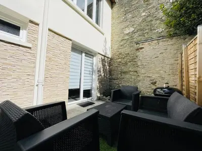 Coin salon dans l'établissement L'Alma 8 : Le Calme au Coeur de Cherbourg