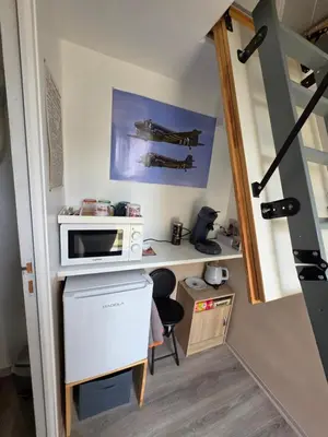 Télévision ou salle de divertissement dans l'établissement chambre indépendante chez l'habitant plein centre de Sainte Mère église