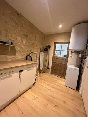 Cuisine ou kitchenette dans l'établissement Le Petit Portais
