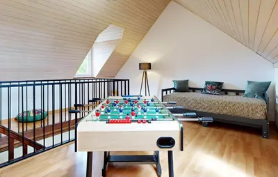 Coin salon dans l'établissement Cozy Home In Sartilly-Baie-Bocage